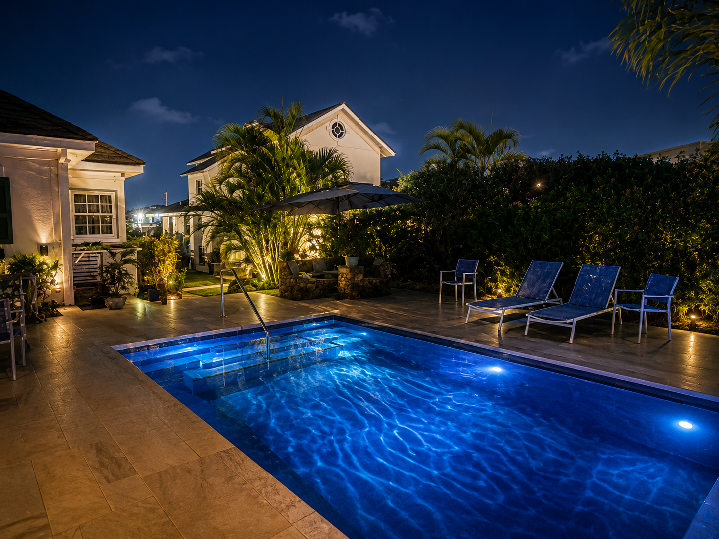 Cottage and pool by night